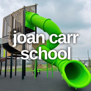 The slides steal the show at Joan Carr School playground.