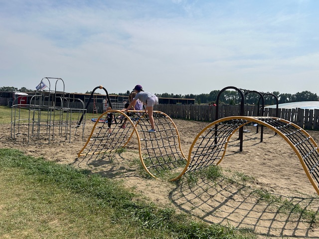Play on a playground at Sassy G's Adventure Farm